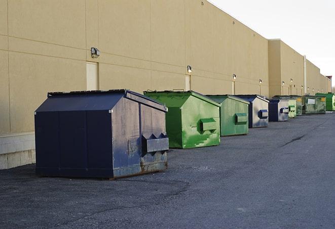 an arrangement of durable and robust disposal containers utilized on a construction project in Bedford